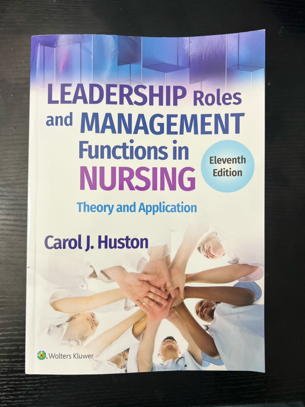 Leadership Roles and Management Functions in Nursing Theory and Application